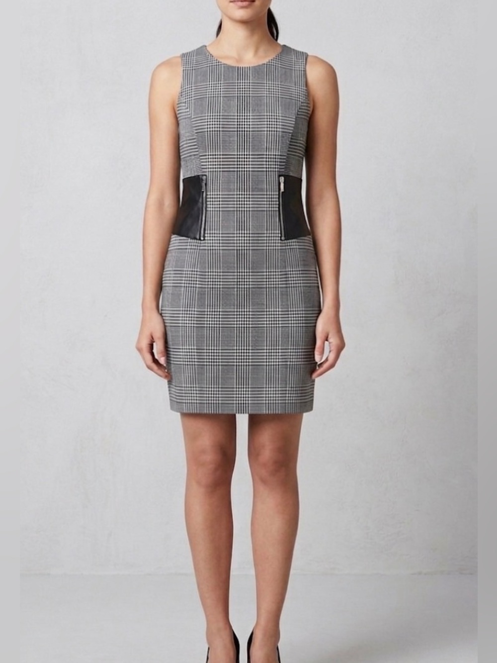 Knee length black and white with faux leather detail dress